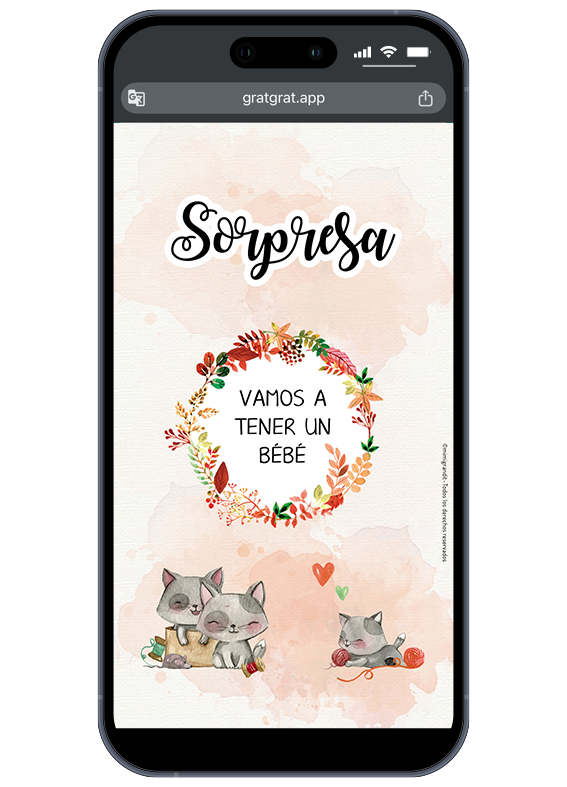 Annonce de grossesse virtuelle en espagnol : « Vamos a tener un bebé ». Écran tactile affichant le résultat d'une carte gratter grossesse espagnol modèle chats indiquant Vamos a tener un bebé.